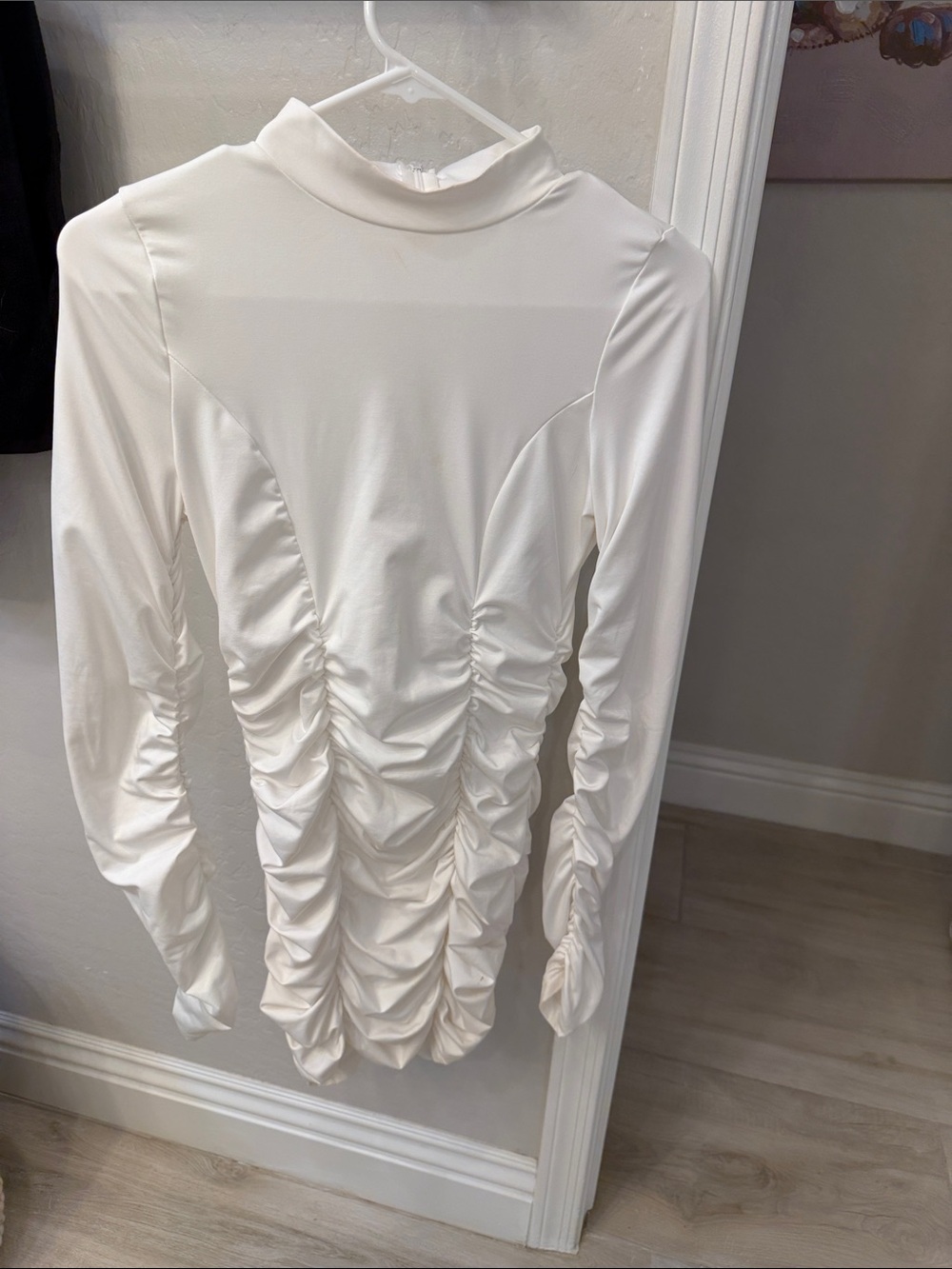 Trendy boutique White Ruched Long-Sleeve Mini Dress. Get ready to party !!